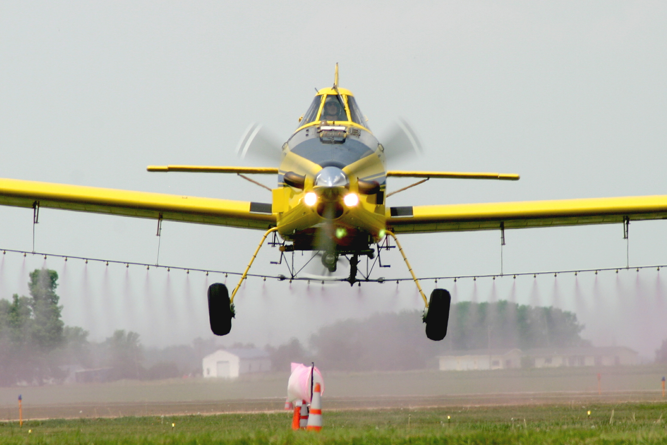 yellow spray plane